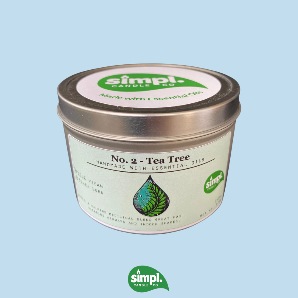 Simpl Candle Co. No. 2 Tea Tree candle on a light blue background