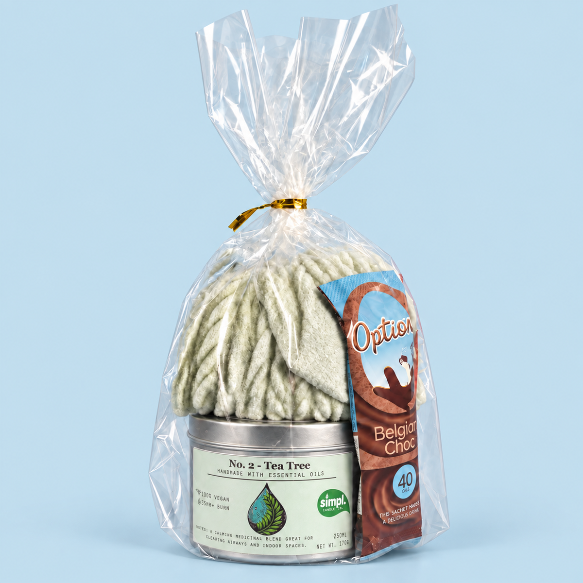Tea Tree candle gift set with sage green socks and Options hot chocolate