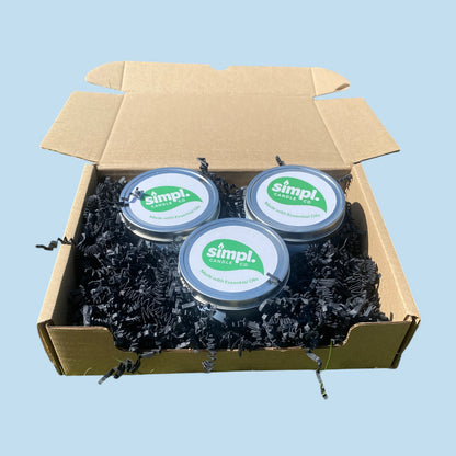 Three Simpl Candles inside a gift box, indicative of the Simpl Candle Bundle