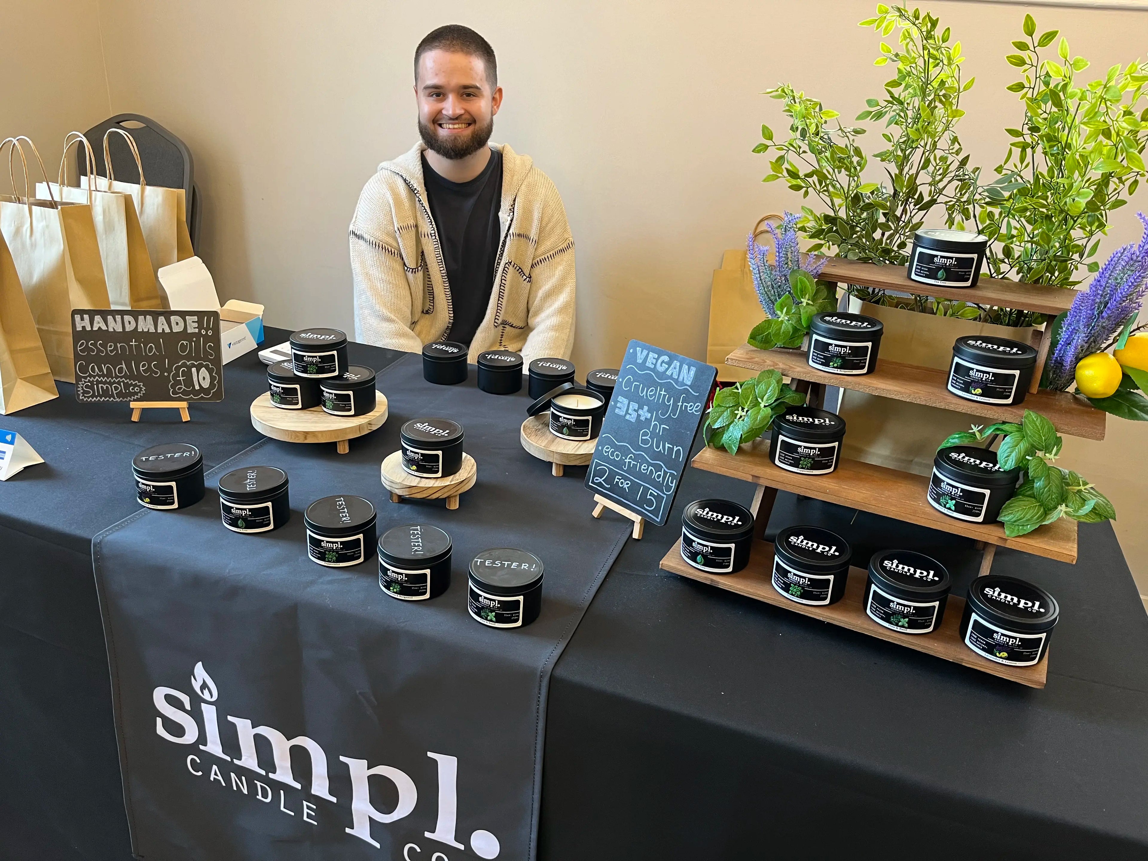 lewis owner running simpl candle stand